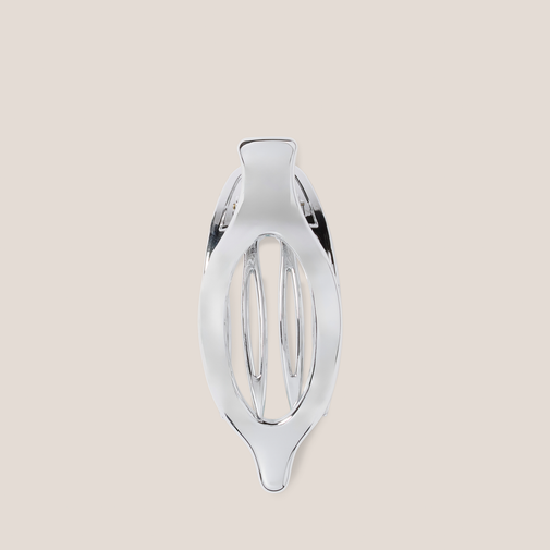 The Hair Edit Silver Flat Lay Claw Clip on a beige background