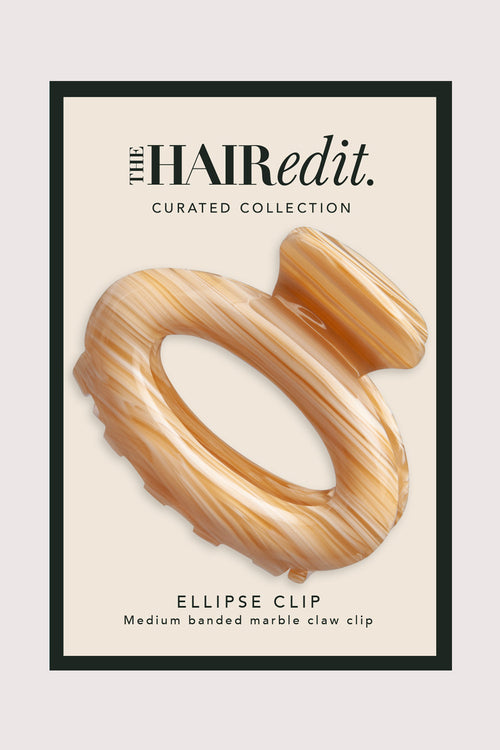 the hair edit ellipse oval hair claw clip in caramel marble in packaging