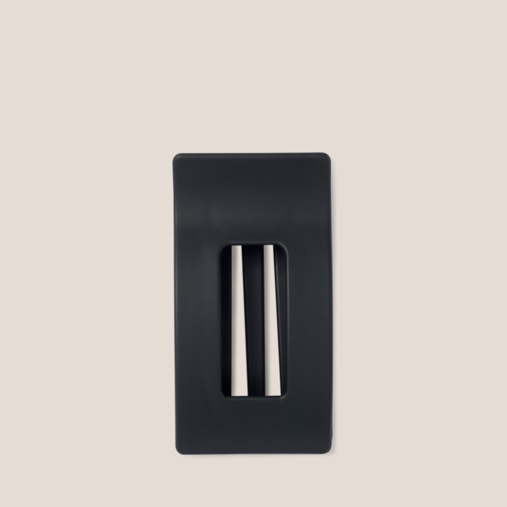 The Hair Edit Flexi Soft Flat Lay Claw Clip on a beige background1