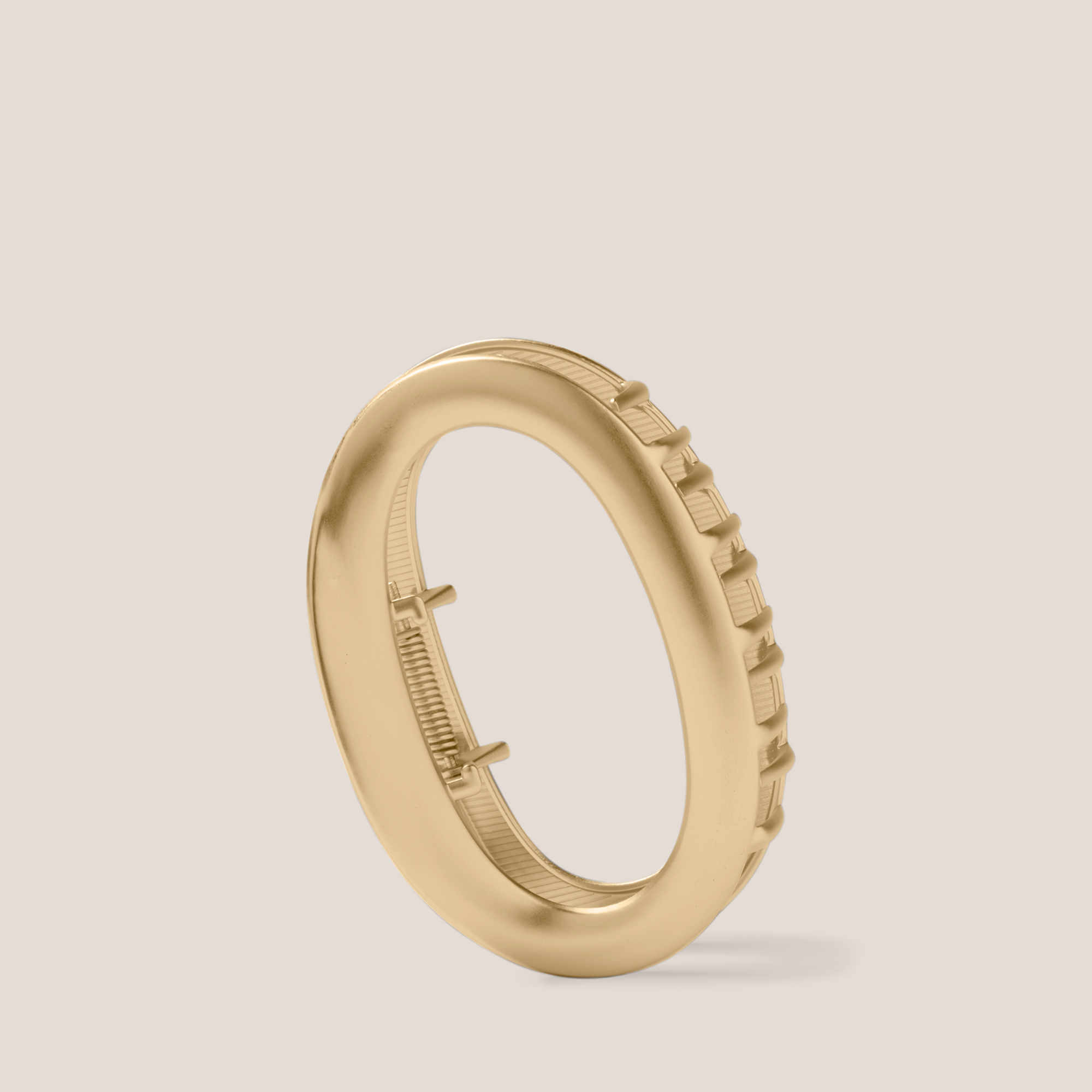 The Hair Edit Gilded Contour Claw Clip on a beige background1