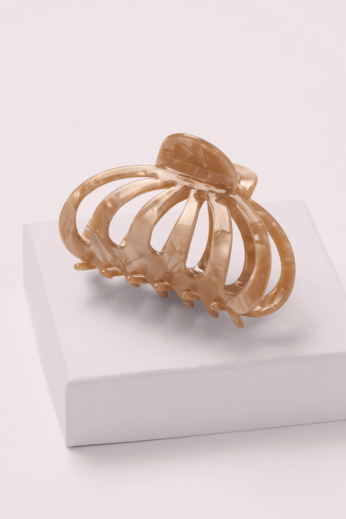 Jellyfish Claw Clip on a pink box 