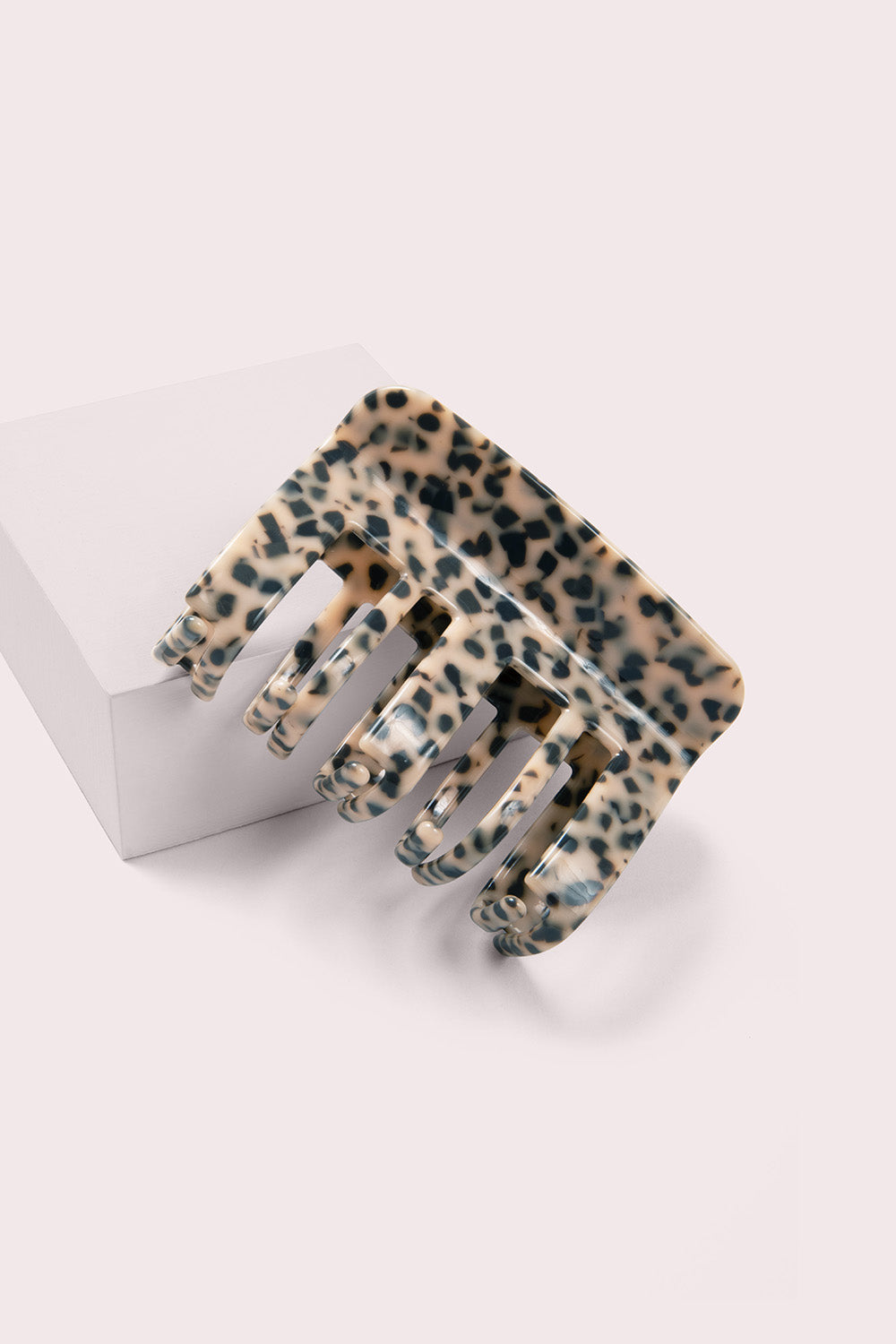 the hair edit wild cheetah claw clip on pink box