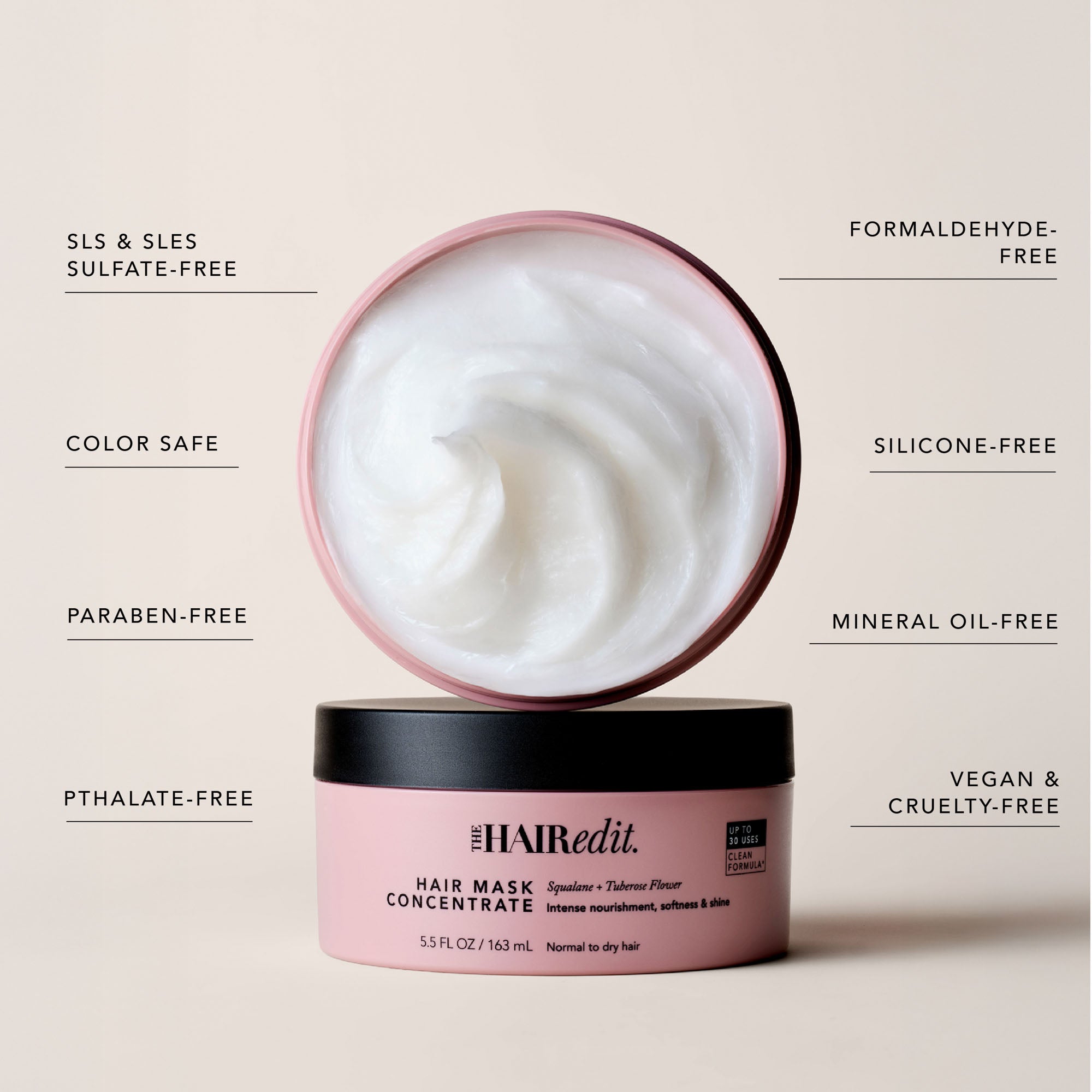 The Hair Edit Hair Mask Concentrate in a pink jar with a black lid, shown open with white cream above it on a beige background with feature callouts.10