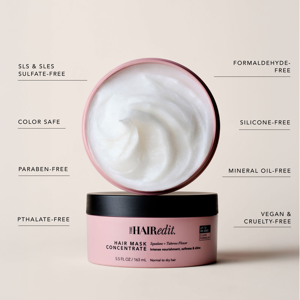 The Hair Edit Hair Mask Concentrate in a pink jar with a black lid, shown open with white cream above it on a beige background with feature callouts.10