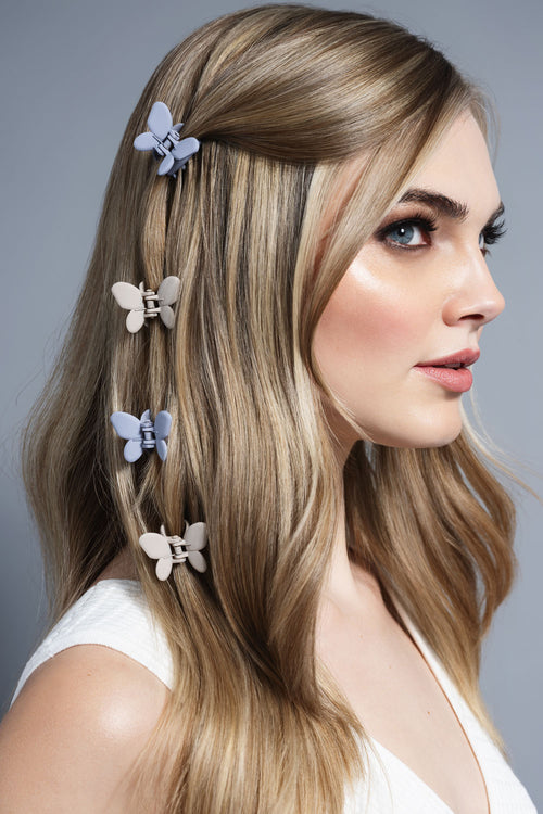 The Hair Edit Mini Butterfly Claw Clips in models hair close up shot 