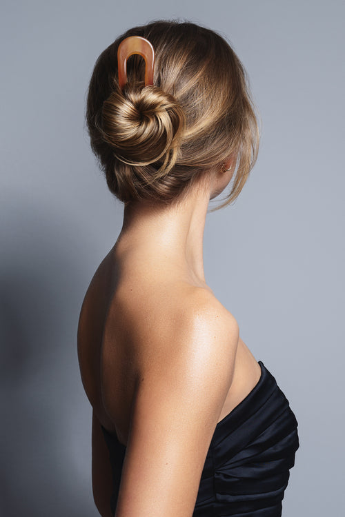 The Hair Edit jumbo chignon French hair pin in models hair 