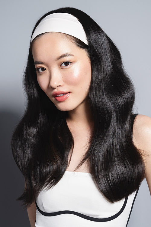 model wearing Lotus Soft Pleated Headband on her head 
