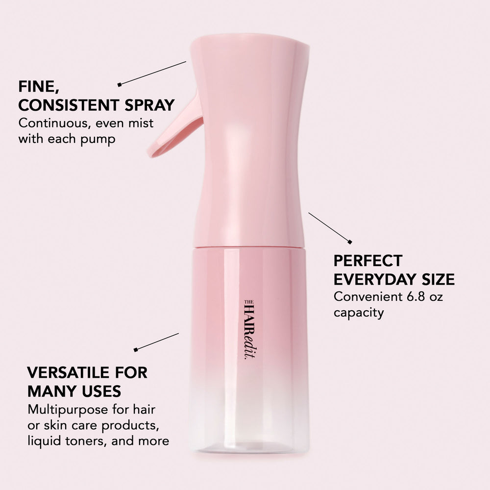 A pink pump bottle labeled THE HAIR EDIT, shown on a pale pink background with callout text describing its fine consistent spray, everyday size capacity, and versatility for hair or skin care products.5
