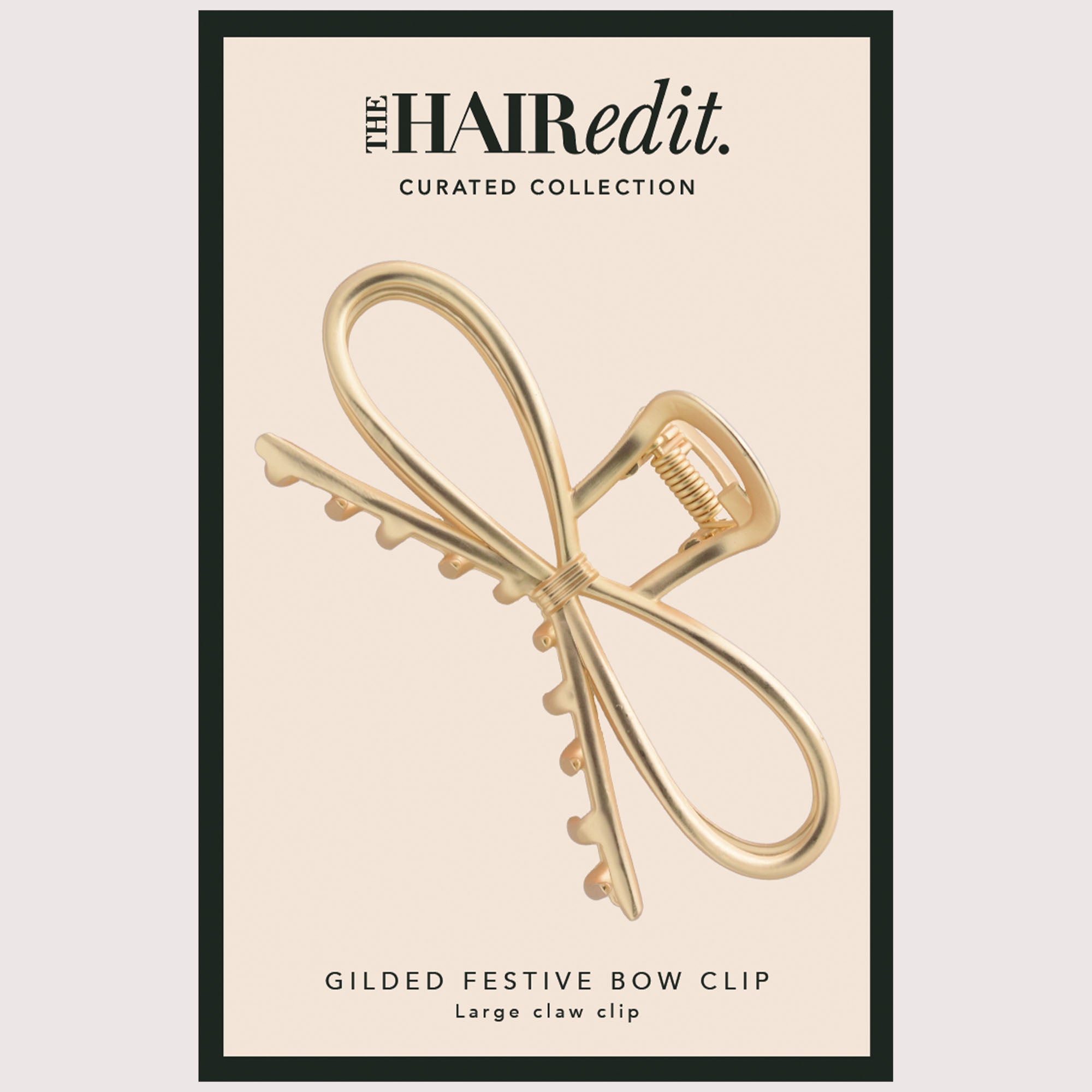 The Hair Edit Gilded Festive Bow Claw Clip front of packaging6