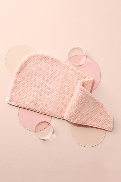 Smooth & Dry Microfiber Hair Wrap on a pink background with bubbles 