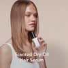 A video of a model demonstrating how to use Scented Dry Oil Hair Serum