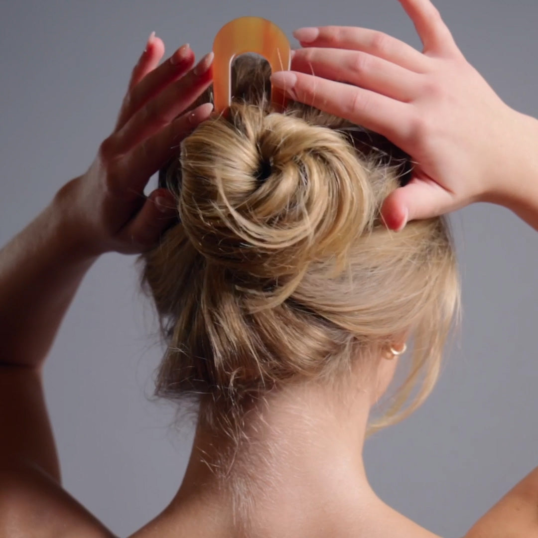 Video of model demonstrating how to wear The Hair Edit's Epic Chignon French Pin8