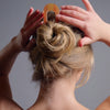 Video of model demonstrating how to wear The Hair Edit's Epic Chignon French Pin