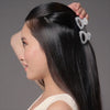 Video of model demonstrating how to wear The Hair Edit's Petite Marble Claw Clips