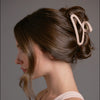 Video of model demonstrating how to wear The Hair Edit's Flexi Soft Claw Clip