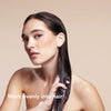 A video of a model demonstrating how to use Hair Mask Concentrate