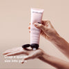 A video of a model demonstrating how to use The Hair Edit’s Conditioner Concentrate