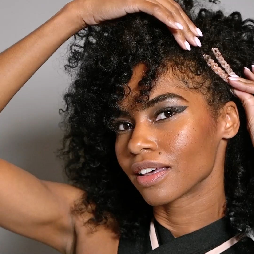 Video of model demonstrating how to wear The Hair Edit's Marble Link Bobby Pins2