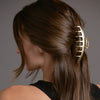 Video of model demonstrating how to wear The Hair Edit's Gilded Timeless Claw Clip