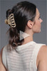 A video of a brunette model with Jellyfish Claw Clip in her hair 