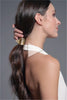 A video of a model putting Gilded Wrap Cuff Claw Clip in her hair 