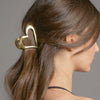 Video of model demonstrating how to wear The Hair Edit's Gilded Romance Claw Clip