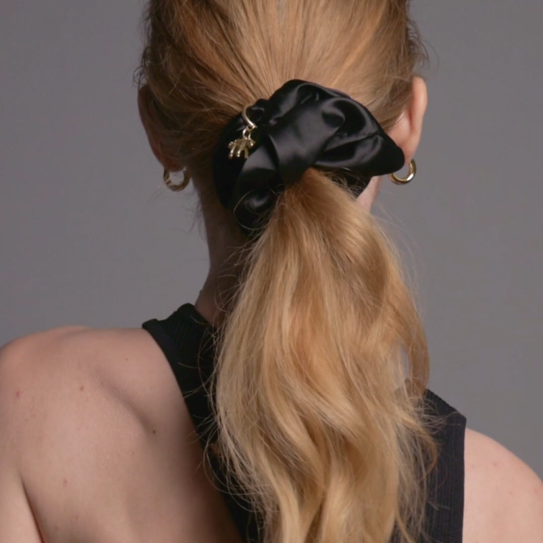 Video of model demonstrating how to wear The Hair Edit's Charming Ruched Ribbons Scrunchie2
