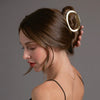 Video of model demonstrating how to wear The Hair Edit's Gilded Contour Claw Clip