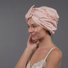 Video of model demonstrating how to wear The Hair Edit's Ultra Luxe Shower Cape