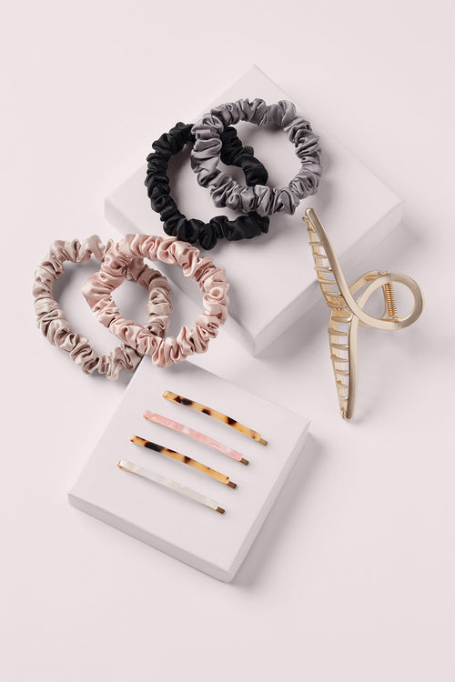 the hair edit best sellers bundle that included ruched ribbon hair ties 4 pack, french twist clip and tortoise barrettes. 