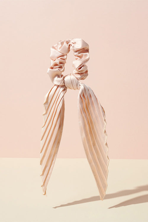 The Hair Edit cream colored pleated ribbon scrunchie hair tie