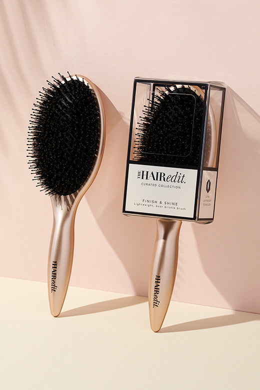 The Hair Edit Finish + Shine Boar Bristle Gold Hair Brushes Displayed with and without packaging