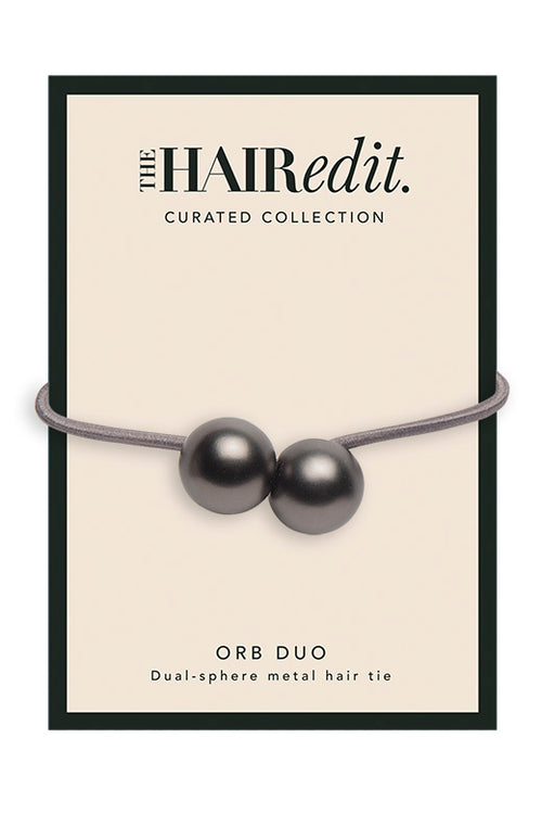 The Hair Edit gunmetal orb duo dual-sphere metal hair tie accessory in packaging