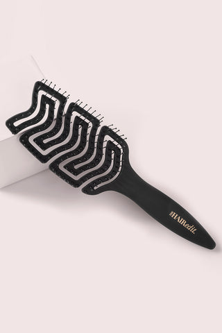 https://www.thehairedit.com/cdn/shop/products/the-hair-edit-S1001-detangle-and-massage-brush_320x480.jpg?v=1679311517