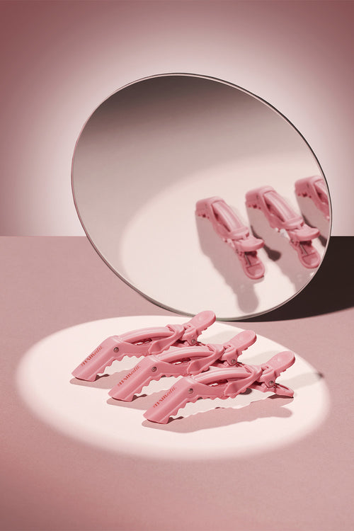 the hair edit pink gator clips with mirror reflection